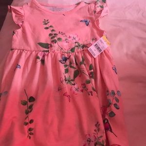 Dress with butterflies and flowers on it